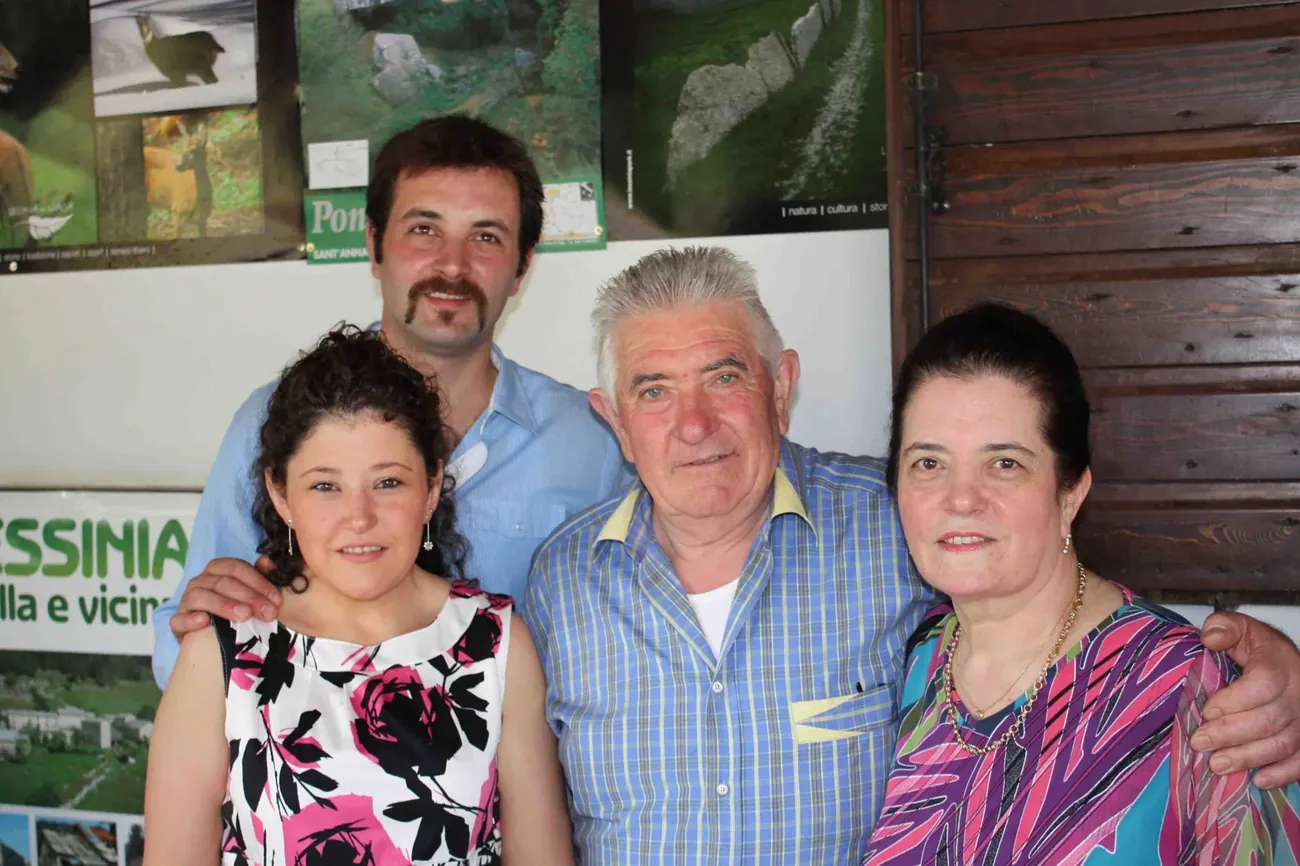 Four members of the Lavarini family together inside the trattoria